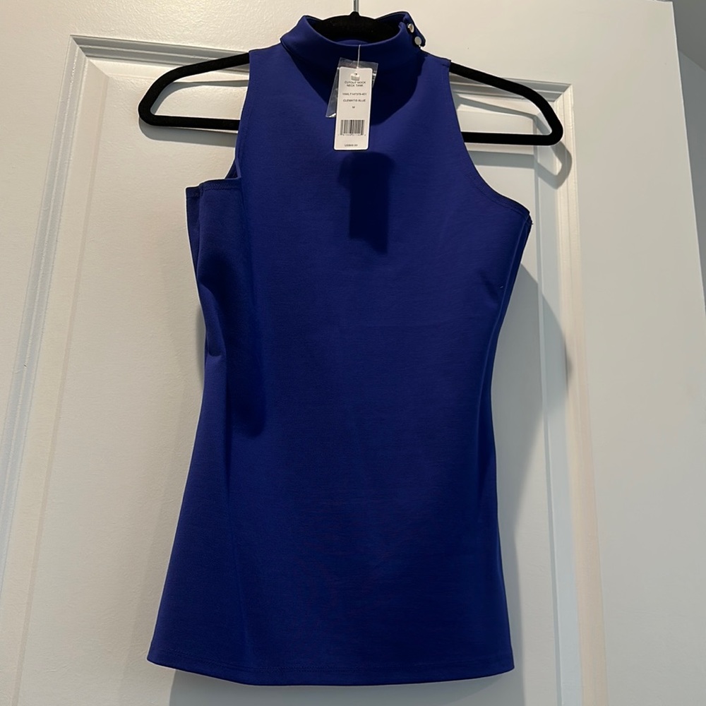 NWT Bebe blue cutout mock neck top. Size M